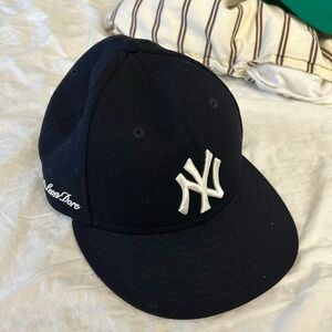 Aime Leon adore Yankees cap